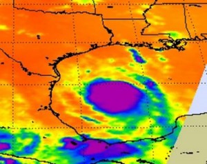 NASA's Aqua satellite passed over Tropical Storm Don at 8:17 UTC (4:17 a.m. EDT) on July 29. The infrared image revealed a large area of powerful, high thunderstorms with cold cloud tops (purple) surrounding the center where cloud temperatures were colder than -63 Fahrenheit (-52 Celsius).  Credit: NASA JPL, Ed Olsen