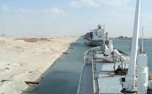 Ships moored at El Ballah during transit of Suez Canal. Source: Wikipedia Commons.