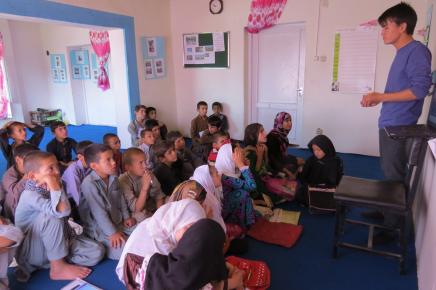 Ali teaching at Street Kids' School. Photo Credit: Voices for Creative Nonviolence