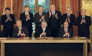 President of Serbia Milosevic, President of Croatia Tudjman, President of Bosnia Izetbegovic signing the Dayton Agreement. Photo Credit: NATO, Wikipedia Commons.