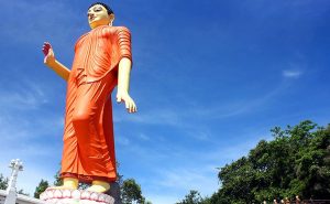80-foot World's tallest statue of walking Buddha in Pilimathalawa, Kandy, Sri Lanka. Photo by AntanO, Wikipedia Commons.