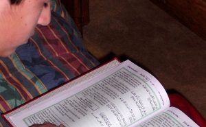 boy reading koran quran islam