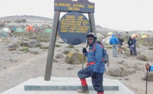 CBK staffer Mr. Gikuhi Ndegwa on the trek to the summit of Mount Kilimanjaro. Photo Credit: CBK.