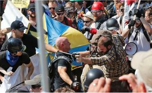 Demonstrators and counterdemonstrators clash at Emancipation Park in Charlottesville, Viriginia, on August 12, 2017. Photo Credit: VOA, Wikipedia Commons.
