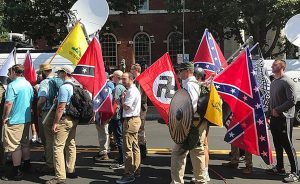 Protesters at Charlottesville, Virginia rally carrying Confederate flags, Gadsden flags and a Nazi Flag. Photo byAnthony Crider, Wikipedia Commons.