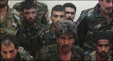 Syrian government soldiers captured by the Islamic State. The battles in Iraq and Syria are wars of annihilation where quarter is rarely given and where most prisoners of war are eventually killed. ISIS has also been vocal about genocidal intentions toward Shiite Muslims and Alawites.