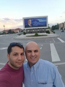 Author Peter Tase (right) in Azerbaijan.