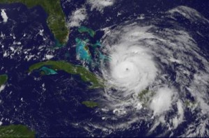 The GOES-13 satellite saw Hurricane Irene entering the Bahamas on Aug. 24, 2011 at 1302 UTC (9:02 a.m. EDT). Irene became a major hurricane shortly before this image and now has a clear, visible eye.  Credit: Credit: NASA/NOAA GOES Project