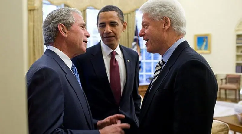George W. Bush, President Obama, and Bill Clinton meeting in the Oval Office, January 16, 2010. Official White House photo by Pete Souza.