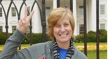Cindy Sheehan in front of White House. Photo by Ben Schumin, Wikipedia Commons.