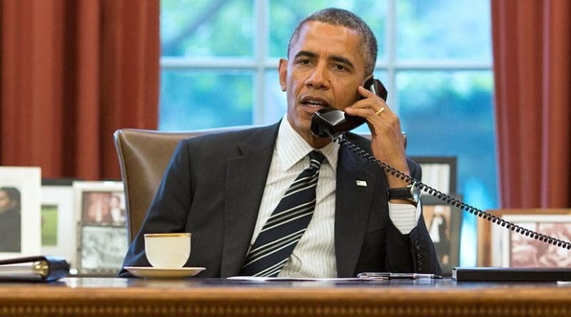 President of the United States, Barack Obama, talks with the President of Iran, Hassan Rouhani, during a telephone call in the Oval Office on 27 September 2013. Photo by Pete Souza, White House.