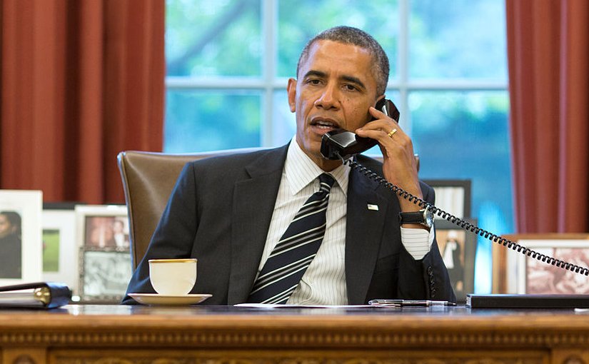 President of the United States, Barack Obama, talks with the President of Iran, Hassan Rouhani, during a telephone call in the Oval Office on 27 September 2013. Photo by Pete Souza, White House.