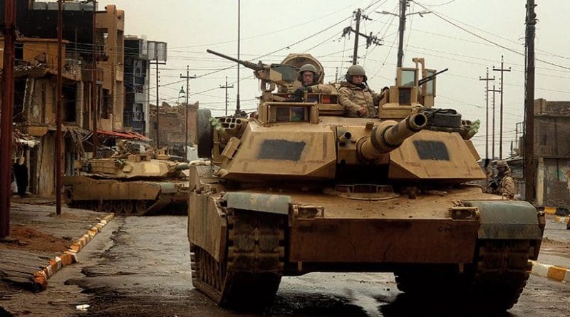 M1 Abrams tanks maneuver in streets of Tall Afar, Iraq, as they conduct combat patrol (U.S. Air Force/Aaron Allmon)