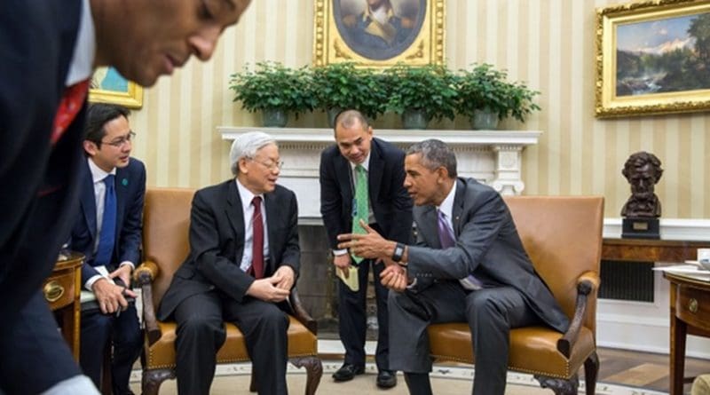 President Barack Obama and Nguyen Phu Trong, General Secretary of the Communist Party of Vietnam, talk while waiting for the press to enter prior to delivering statements following their bilateral meeting in the Oval Office, July 7, 2015. (Official White House Photo by Pete Souza)