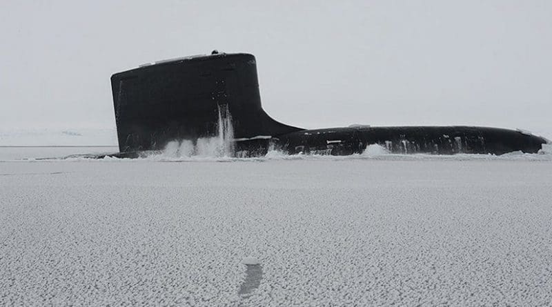 Attack submarine USS New Mexico surfaces at Ice Camp Nautilus in Arctic Ocean during Ice Exercise 2014 (DOD/Joshua Davies)