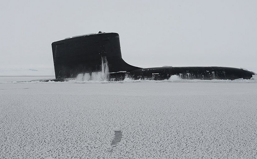 Attack submarine USS New Mexico surfaces at Ice Camp Nautilus in Arctic Ocean during Ice Exercise 2014 (DOD/Joshua Davies)