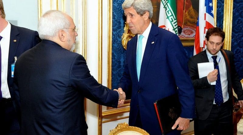 U.S. Secretary of State John Kerry shakes hands with Iranian Foreign Minister Mohammad Javad Zarif in Vienna, Austria, on July 13, 2014, before they begin a bilateral meeting focused on Iran's nuclear program. Photo Credit: US State Department.