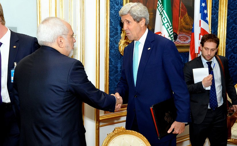 U.S. Secretary of State John Kerry shakes hands with Iranian Foreign Minister Mohammad Javad Zarif in Vienna, Austria, on July 13, 2014, before they begin a bilateral meeting focused on Iran's nuclear program. Photo Credit: US State Department.