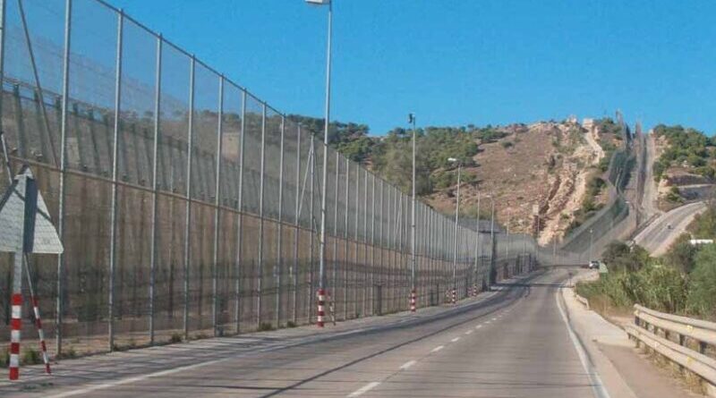 Melilla border fence separating Spain and Morocco.