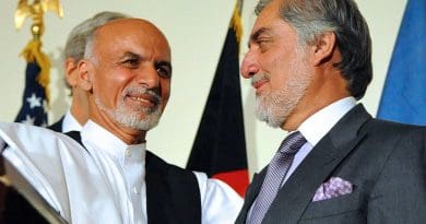 Afghanistan's Ashraf Ghani shakes hands with Abdullah Abdullah. Photo Credit: U.S. Department of State, Wikimedia Commons.