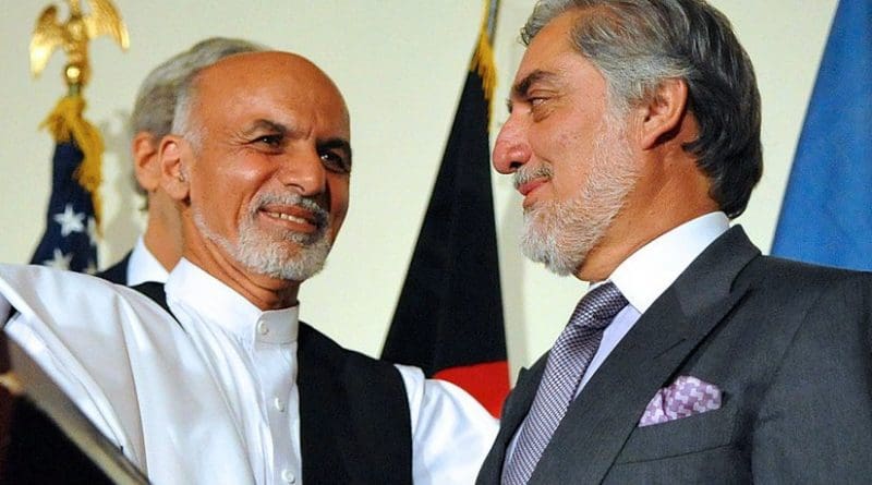 Afghanistan's Ashraf Ghani shakes hands with Abdullah Abdullah. Photo Credit: U.S. Department of State, Wikimedia Commons.
