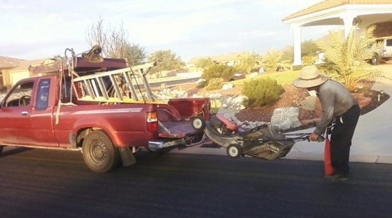 Cecilia's Father in his landscaping truck. Family photo courtesy of Cecilia Velasco