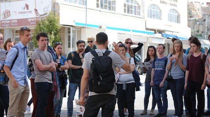 ‘Breaking The Silence’ takes a group on a tour of Hebron where they learn first hand about life under occupation. Credit: Mel Frykberg