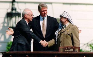 Yitzhak Rabin, Bill Clinton, and Yasser Arafat at the Oslo Accords signing ceremony on September 13, 1993. Photo Credit: Vince Musi, The White House.