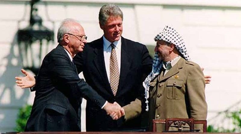 Yitzhak Rabin, Bill Clinton, and Yasser Arafat at the Oslo Accords signing ceremony on September 13, 1993. Photo Credit: Vince Musi, The White House.