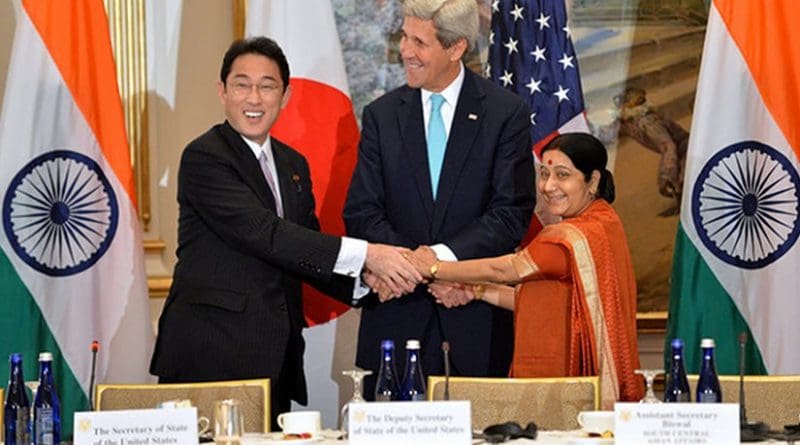 U.S. Secretary of State John Kerry with Japanese Foreign Minister Fumio Kishida and Indian External Affairs Minister Sushma Swaraj at the inaugural U.S.-India-Japan Trilateral Ministerial, on the sidelines of the 70th Regular Session of the UN General Assembly in New York, New York on September 29, 2015.