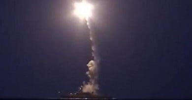 A screenshot from a video released by Russia's defense ministry shows a Russian warship firing cruise missiles into Syria from the Caspian Sea.