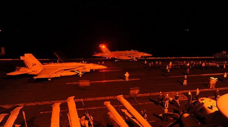 FA-18 Hornets takes off from USS George H.W. Bush to strike ISIL targets in Syria. U.S. Navy photo by Mass Communication Specialist 3rd Class Robert Burck.