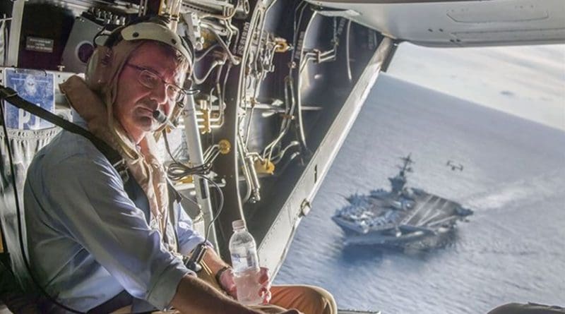 The USS Theodore Roosevelt can be seen in the background as Secretary of Defense Ash Carter flies in a V-22 Osprey after visiting the aircraft carrier with Malaysian Minister of Defense Hishammuddin Hussein Nov. 5, 2015. DoD photo by Air Force Senior Master Sgt. Adrian Cadiz