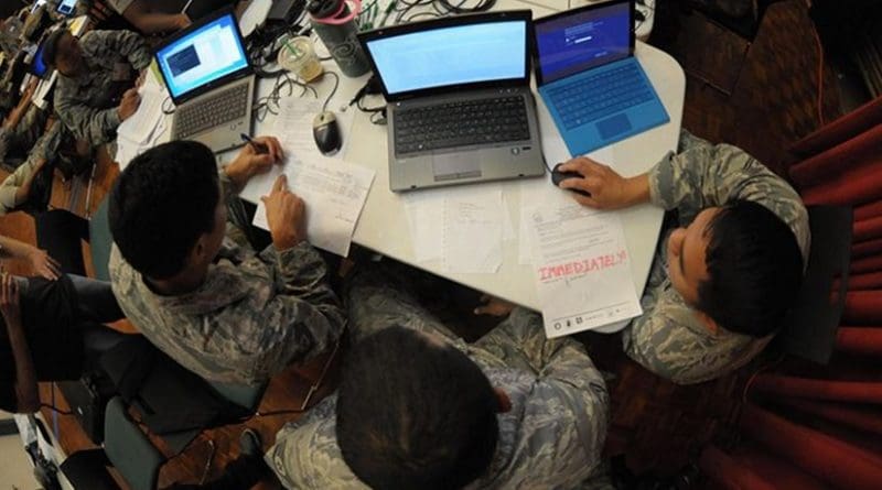 Hawaii Air National Guardsmen evaluate network vulnerabilities during the Po’oihe 2015 Cyber Security Exercise at the University of Hawaii Manoa Campus Center Ballroom, June 4, 2015. Po’oihe is part of the hurricane preparedness exercise Vigilant Guard/Makani Pahili 2015 hosted by U.S. Northern Command, the National Guard Bureau and the Hawaii Emergency Management Agency. Hawaii Air National Guard photo by Airman 1st Class Robert Cabuco