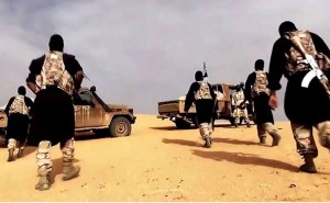 AQIM fighters in a propaganda video, somewhere in the Sahara desert. Source: Al-Andalus Media Productions, the media branch of al-Qaeda in the Islamic Maghreb, Wikipedia Commons.