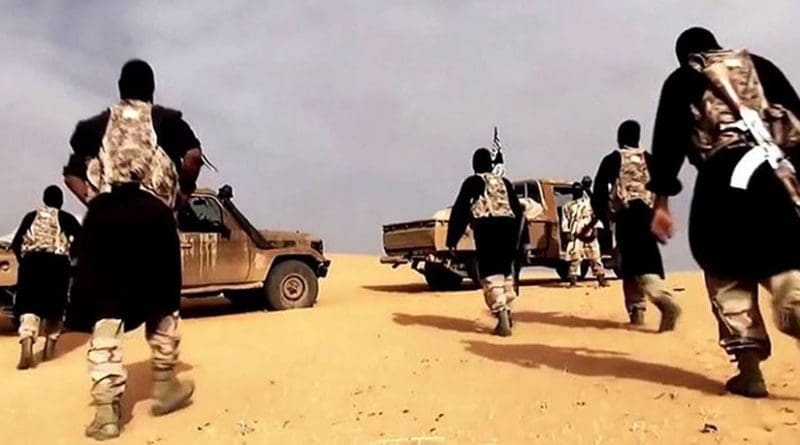 AQIM fighters in a propaganda video, somewhere in the Sahara desert. Source: Al-Andalus Media Productions, the media branch of al-Qaeda in the Islamic Maghreb, Wikipedia Commons.