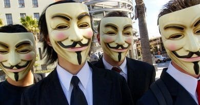 Anonymous with Guy Fawkes masks. Photo by Vincent Diamante, Wikipedia Commons.