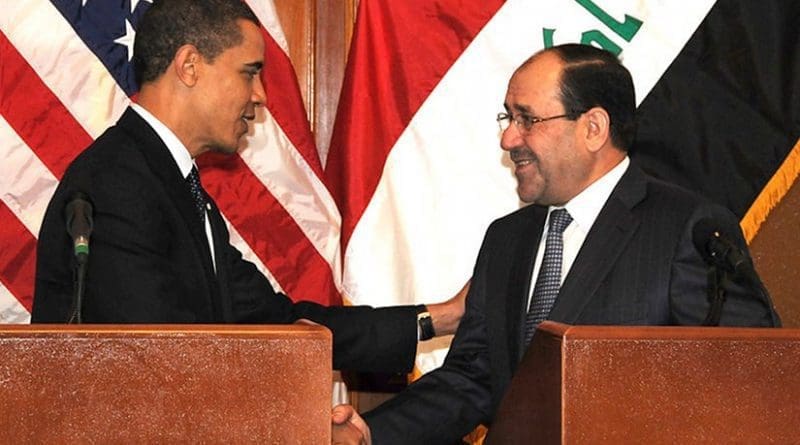 Iraq Prime Minister Nouri al-Maliki shakes hands with U.S. President Barack Obama in Baghdad. Photo by Spc. Kimberly Millett, USA, Wikipedia Commons.