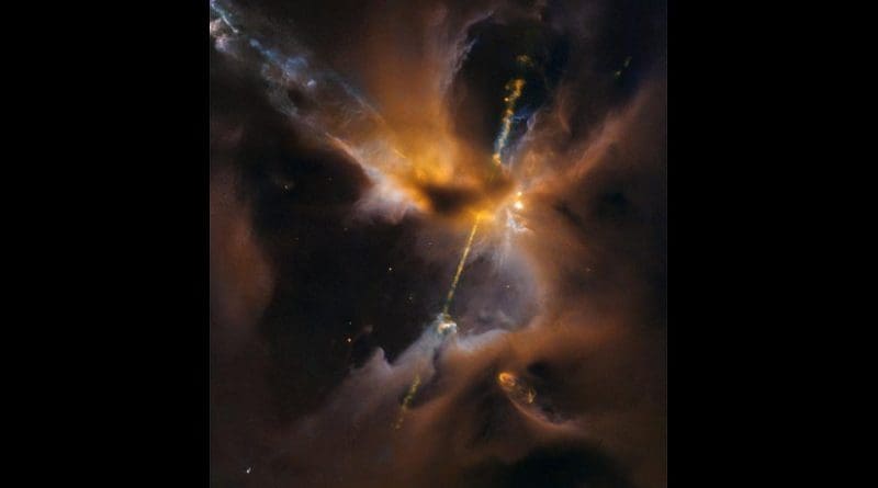The two lightsaber-like streams crossing the image are jets of energized gas, ejected from the poles of a young star. If the jets collide with the surrounding gas and dust they can clear vast spaces, and create curved shock waves, seen as knotted clumps called Herbig-Haro objects. Credit: ESA/Hubble & NASA, D. Padgett (GSFC), T. Megeath (University of Toledo), and B. Reipurth (University of Hawaii)