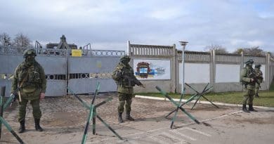 Russia's "Little green men" armed with AK-74Ms blockading Perevalne military base, 25 kilometres south of Simferopol, 9 March 2014. Photo by Anton Holoborodko, Wikipedia Commons.