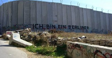 Graffiti on the road to Bethlehem in the West Bank stating "Ich bin ein Berliner" (English: "I am a Berliner"). Photo by Marc Venezia, Wikipedia Commons.