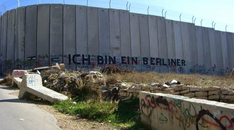 Graffiti on the road to Bethlehem in the West Bank stating "Ich bin ein Berliner" (English: "I am a Berliner"). Photo by Marc Venezia, Wikipedia Commons.
