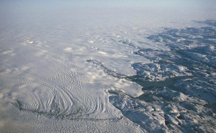 A new study shows clouds are playing a larger role in heating the Greenland Ice Sheet than scientists previously believed, raising its temperature by 2 to 3 degrees compared to cloudless skies and accounting for as much as 30 percent of the ice sheet melt. Credit: Hannes Grobe