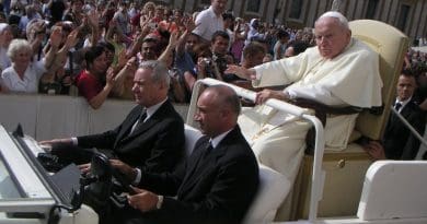 An ailing John Paul II riding in the Popemobile. Source: Wikipedia Commons.