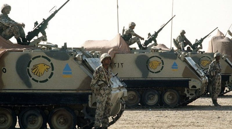 Egyptian soldiers man M-2 .50-caliber machine guns atop M-113 armored personnel carriers during a demonstration for visiting dignitaries, part of Operation Desert Shield. Photo Credit: ech. Sgt. H. H. Deffner, Wikipedia Commons..