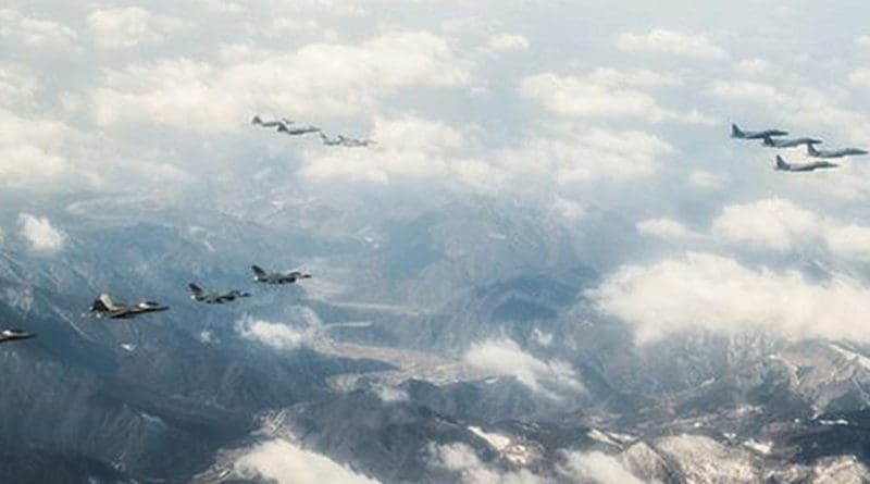 Four U.S. Air Force F-22 "Raptor" fighter aircraft from Kadena Air Base, Japan, fly over the skies of South Korea, in response to recent provocative action by North Korea Feb. 17, 2016. The Raptors were joined by four F-15 Slam Eagles and U.S. Air Force F-16 Fighting Falcons. The F-22 is designed to project air dominance rapidly and at great distances and currently cannot be matched by any known or projected fighter aircraft. (U.S. Air Force photo by Airman 1st Class Dillian Bamman/Released)