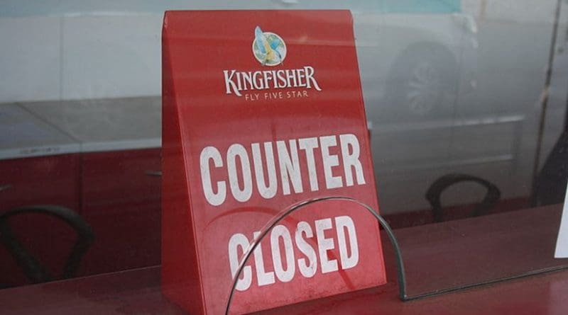 A closed counter after Kingfisher Airlines stopped its service. Photo by Arne Hückelheim, Wikipedia Commons.