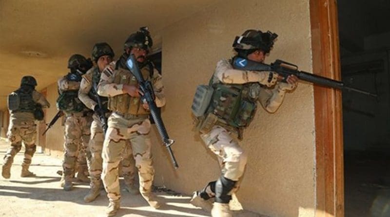 Iraqi soldiers from 2nd Battalion, 71st Brigade, enter a room after breaching the doorway to ensure that it is clear at Camp Taji, Iraq, Jan. 10, 2016. Task Group Taji provides company-level urban operations training to teach Iraqis how to move and communicate in an urban environment. Training at the building partner capacity sites is an integral part of Combined Joint Task Force – Operation Inherent Resolve’s multinational effort to train Iraqi security force personnel to defeat the Islamic State of Iraq and the Levant. Army photo by Sgt. Kalie Jones