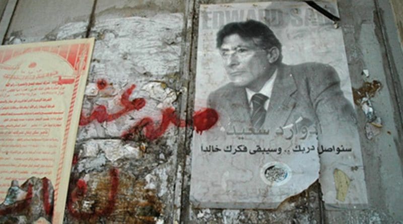 In Memoriam Edward Wadie Saïd: a Palestinian National Initiative poster at the Israeli West Bank wall. Photo taken by Justin McIntosh, Wikipedia Commons.