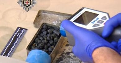 Screengrab from a video footage distributed on April 28, 2016 by the Georgian State Security Service showing investigators checking the radioactivity level of what the security service said was seized 1.6kg of uranium.